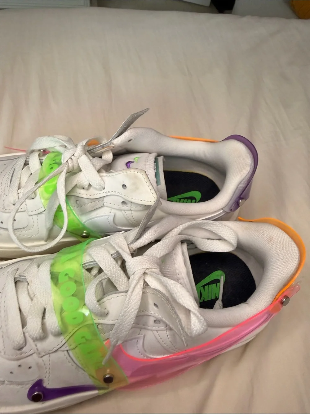 Nike White Sneakers with Neon Pink, Green, Purple, and Orange Accents